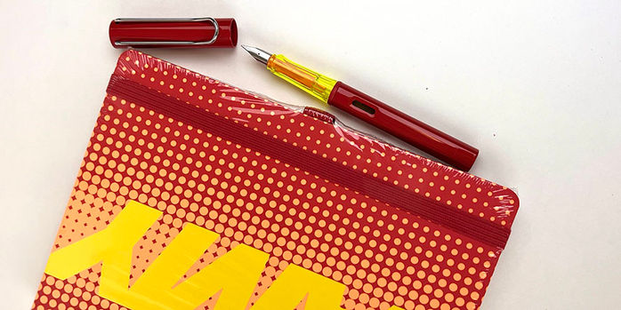 lamy_2022_special_edition_glossy_red_al_star_fountain_pen_and_notebook_uncapped by notebook